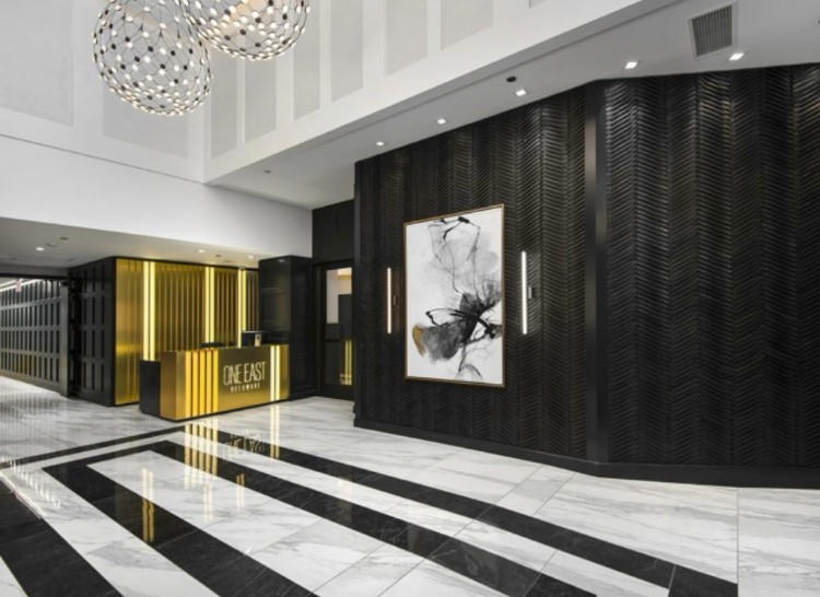 One East Delaware lobby with the gold front desk